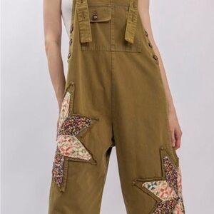 Olive Star Patch Jumpsuit \ P2P 24.5’ \ hips 29’ / length bib to hem 47’ approx
